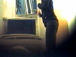 Girl using the toilet and filmed by voyeur 1